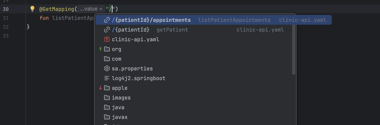 Typing a path inside a GetMapping annotation in a Kotlin API interface. Completion lists the unimplemented operation first, then the other spec paths.
