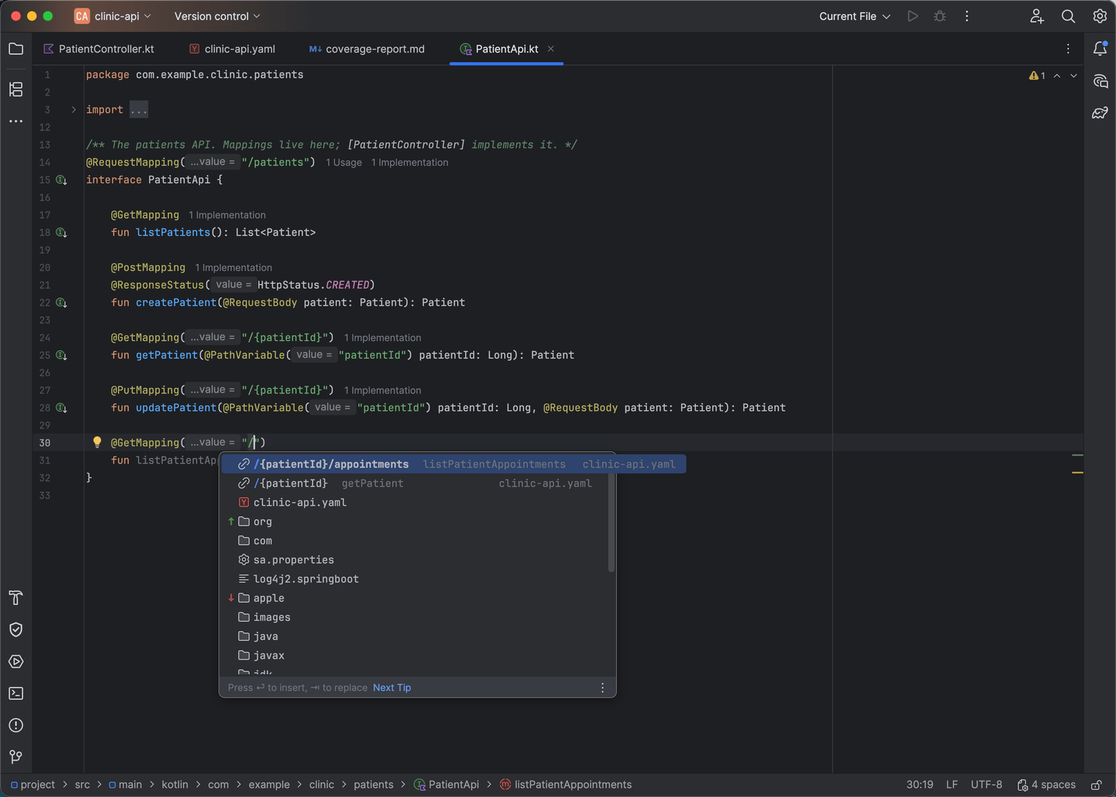 Typing a path inside a GetMapping annotation in a Kotlin API interface, with completion offering the unimplemented operation first and other spec paths after it